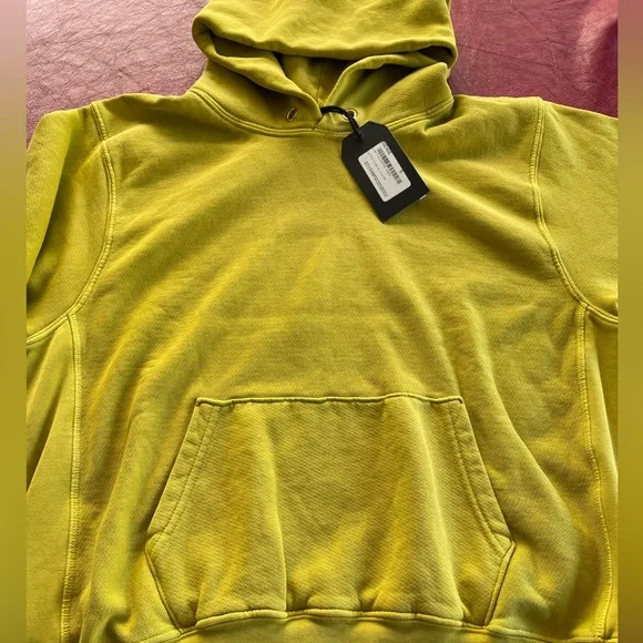 Unisex hoodie by Les Tien.